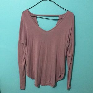 Soft pink long sleeve sweater with open back